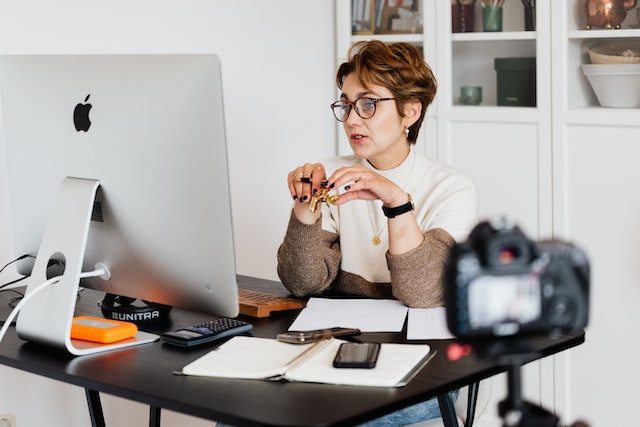 Woman talking on a video call on a video media server