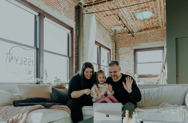 A happy family talking on a video call